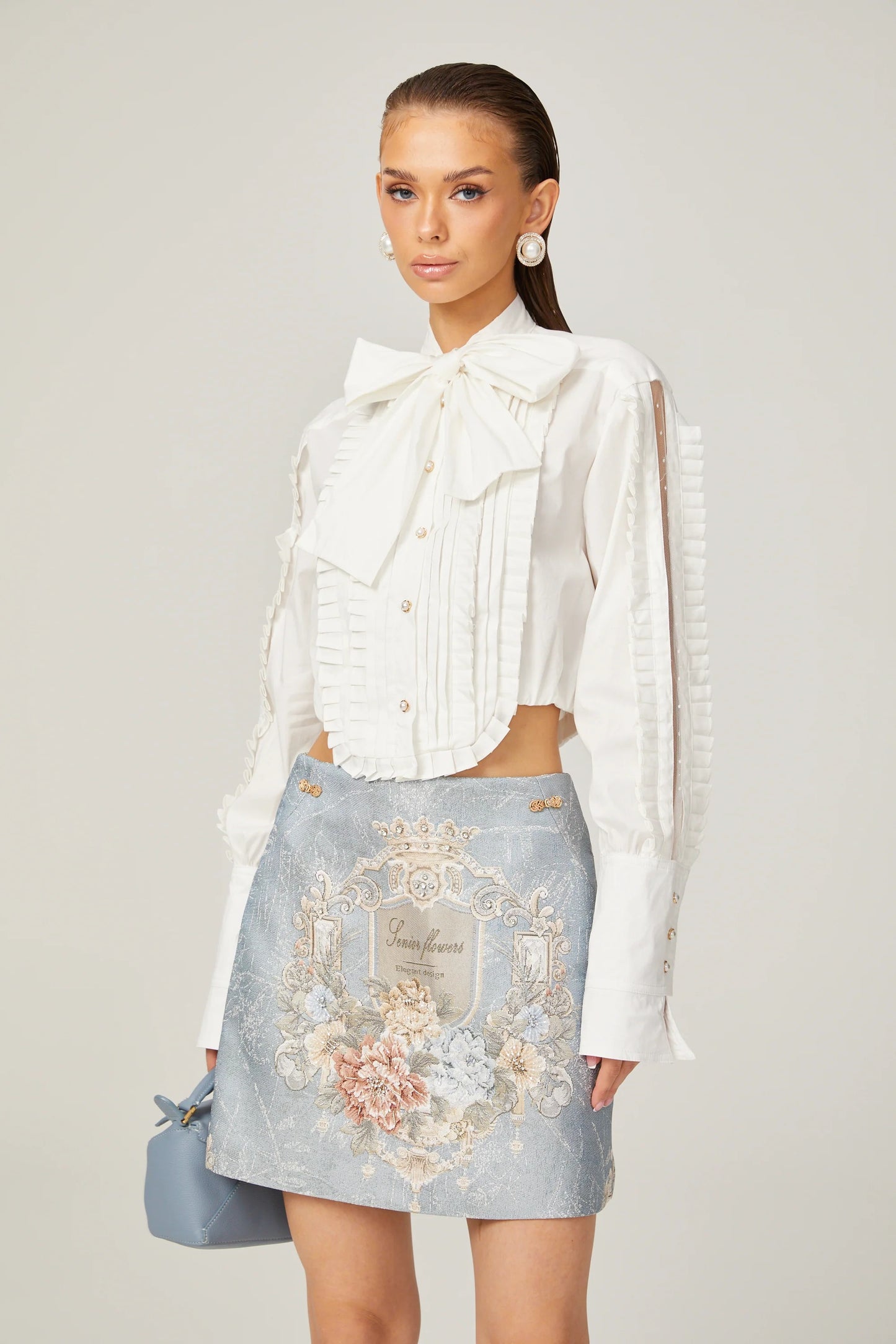 Céleste white pleated scarf-collar shirt
