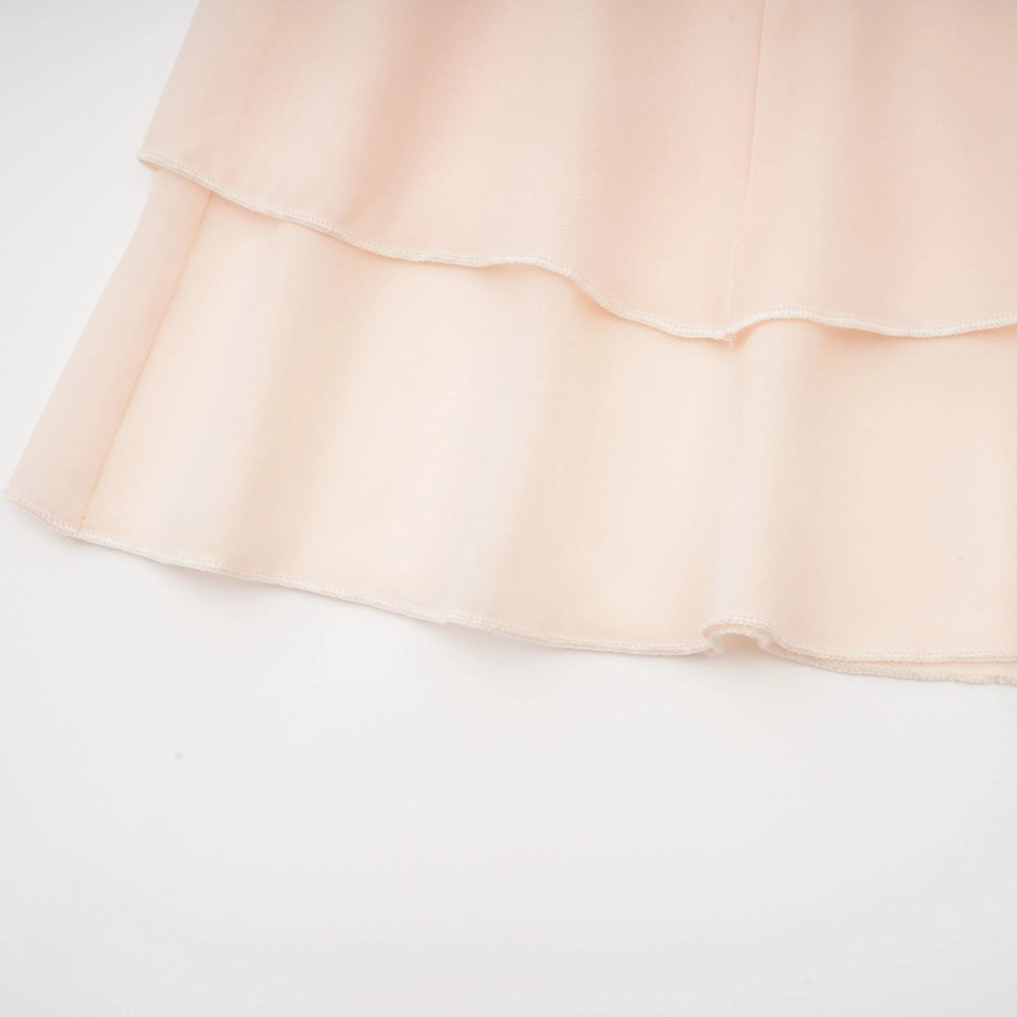 Esmerie Sleeveless Bustier Mini Dress with Back Tie Detail
